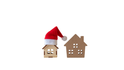 Festive Wooden House Miniatures with Santa Hats Duo Set Isolated on Transparent Background.