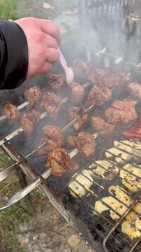 Smoky Charcoal Grill Cooking Meat And Vegetables