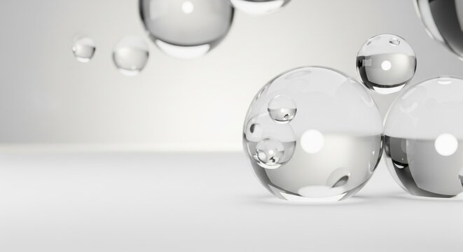 Monochrome abstract background featuring a luminous glass orbs with delicate light effects