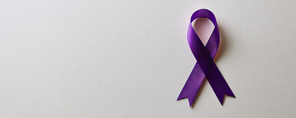 Purple ribbon on white background representing general cancer awareness, Alzheimer's disease, domestic violence awareness. Dementia diagnosis Old Age-related health mental health problems, memory loss