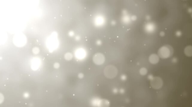 Glowing gold bokeh light background.