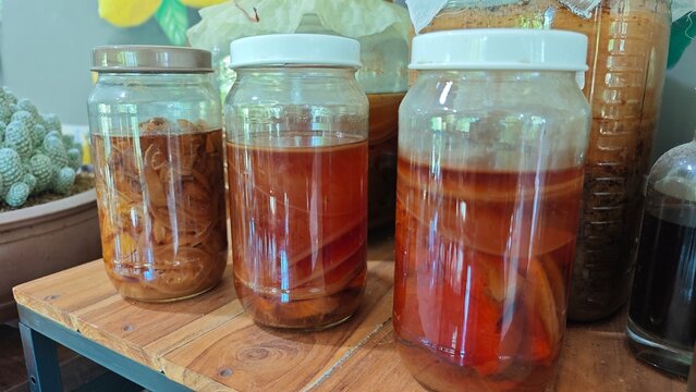 Kombucha Scoby in a glass jar. Fermented drink.