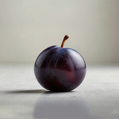 Fresh purple plum with water droplets on smooth surface showcasing texture