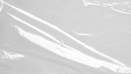 plastic overlay texture of realistic crumpled transparent plastic film wrap on white background,wrinkled stretched plastic effect.	crumpled plastic background