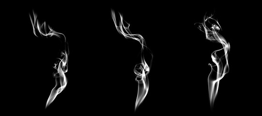 Abstract white smoke rising on a black background, creating fluid shapes and elegant motion ideal for creative design, backgrounds, and artistic concepts in modern visual projects.