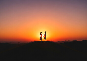 Fototapeta premium A romantic silhouette of a couple holding hands against a vibrant sunset sky, symbolizing love, togetherness, and Valentine’s Day.