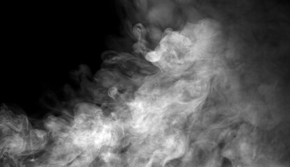 Dense white smoke drifting on a dark background creates a dramatic atmospheric texture, ideal for...