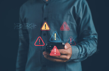 Cybersecurity mobile alert concept showing user holding smartphone with multiple digital warning icons, representing data threats, system risk, security notifications, and mobile protection awareness.