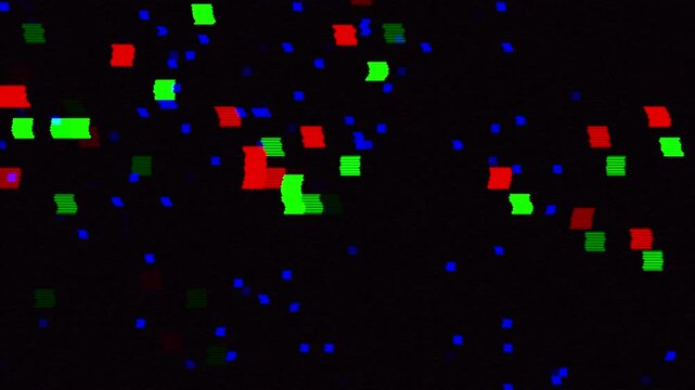 numerous lively tiny particles disperse against dark contrasting backdrop