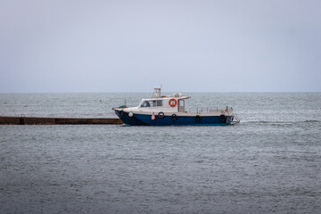 A  small fishing harbour set into Beadnell Bay, on the Northumberland Coastline, September 2025