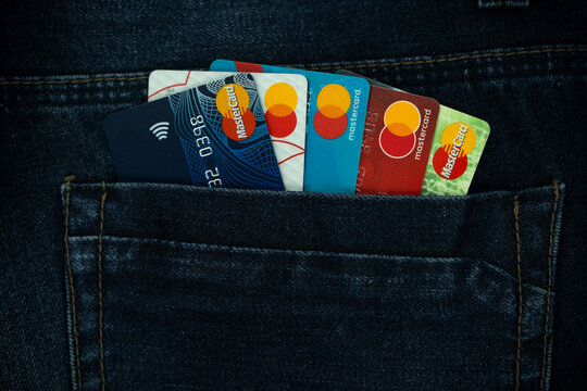 Mastercard Inc. is a company and membership organization of over 25,000 financial institutions issuing payment cards. 5 different payment cards with the Mastercard logo