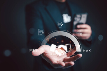 Businessman showing digital handshake icon with contract documents, symbolizing trust, business agreement, negotiation, partnership, and secure deal in modern digital business environment.