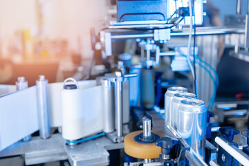 Automated beer canning process in modern brewery facility