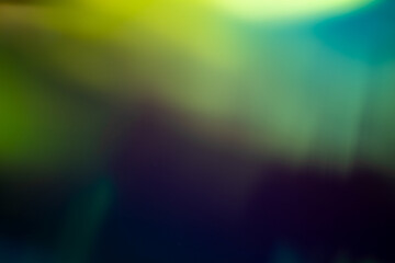 light leak overlay effect with blur green light leaks,retro noisy film texture light leak flare on black background,abstract background with green light,grunge old film burn ray