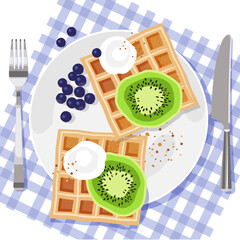 Waffles with kiwi slices and blueberries are drawn in a flat style with texture, close-up, top view. Breakfast service with pastries, fruits, and berries. Stock vector illustration. EPS 10.