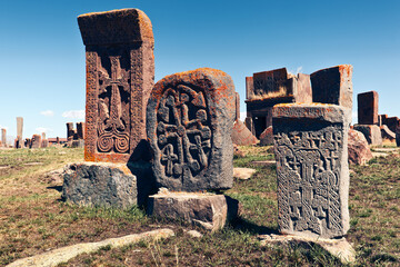 Khachkar - medieval Armenian headstone bearing cross, life scenes or decorative interlaces and botanical motifs. Noratus cemetery, Gegharkunik Province, Armenia