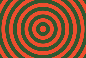 Bold concentric circles in alternating green and orange creating a hypnotic, optical illusion pattern.