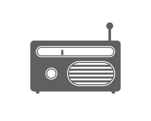 Vintage radio icon in monochrome gray. Minimalist retro design with antenna, knob, tuner, and speaker grill. Nostalgic tech illustration.
