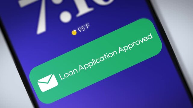 Loan Application Approved email notification appearing on the smartphone screen close up 4k footage