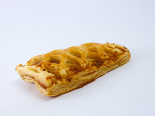 Golden lattice puff pastry isolated on a clean white background