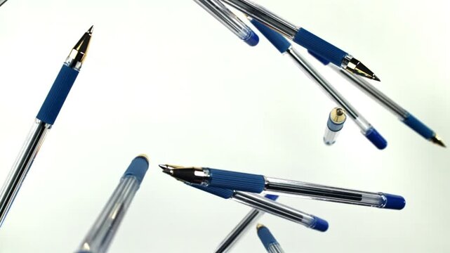 School pens fly up and down. Filmed on a high-speed camera at 1000 fps. High quality FullHD footage