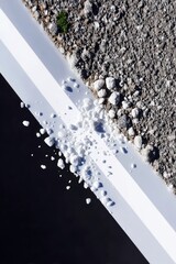 White Rocks Falling on Black Surface and Textured Ground