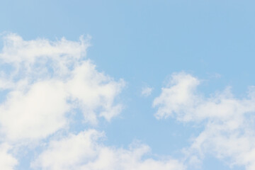 Beautiful blue sky with light white cloud background, dancer overcast. Demonstrating color, trend...