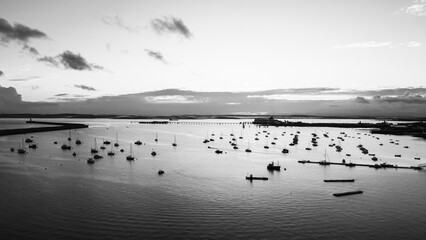 Aerial black and white view of Holyhead harbour with moored boats
