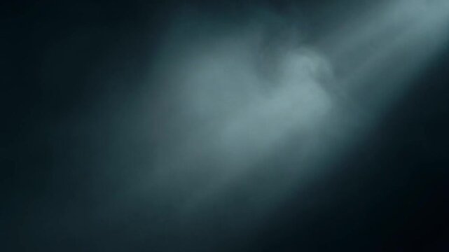 暗闇の中を照らす一筋の光と舞う煙、ミステリアスでドラマチックな背景素材