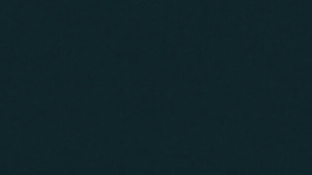 Abstract dark green ink animation spreading smoothly on a white background