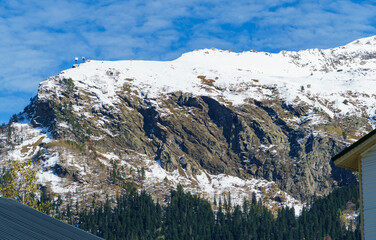 Picturesque landscape in Dombay with amazing snow-capped peaks and majestic blue slopes of North  Caucasus Mountains