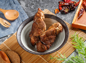 Savory slow cooked pork pieces served elegantly in a rustic bowl ready for a delicious meal
