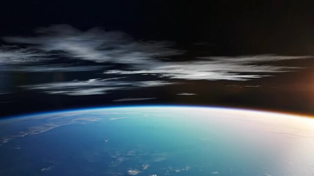 Planet Earth's Curved Horizon and Glowing Atmosphere at Twilight from Outer Space