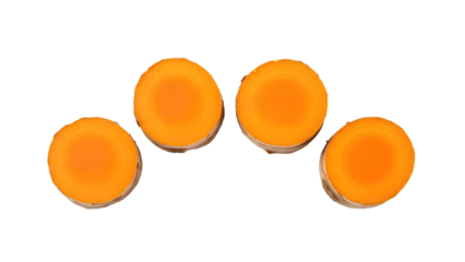 Sliced Turmeric Root PNG. Row of four round orange curcuma pieces. Fresh raw herbal spice circles for healthy cooking and medicine. Natural organic anti-inflammatory food ingredient texture top view