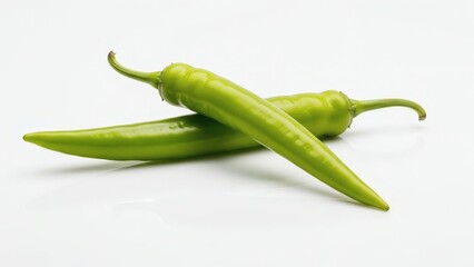 Fresh green chili peppers with isolated on a clean white background, and food photography.