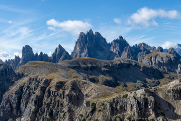 Panoramic view of Cadini di Misurina jagged mountains with patches of clouds near Tre Cime di Lavaredo peaks also called Drei Zinnen in Dolomite Alps near Cortina d'Ampezzo, Italy