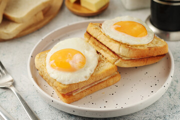 A croque madame sandwich, traditional dish of French cuisine	