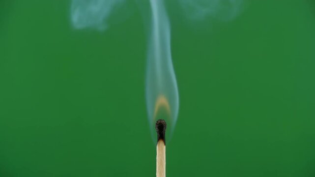 Match Ignites - A Close-Up of Flame and Smoke.