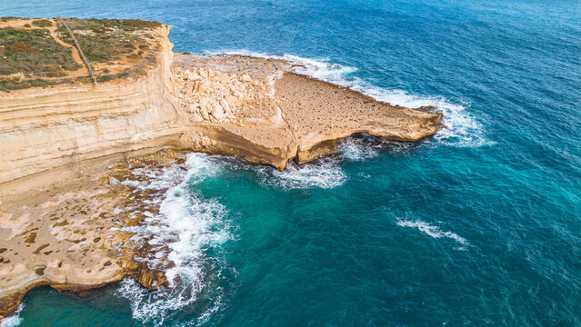 Scenic cliffside of Malta coastline.