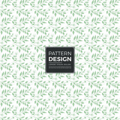 Seamless floral pattern featuring green leaves and delicate flowers