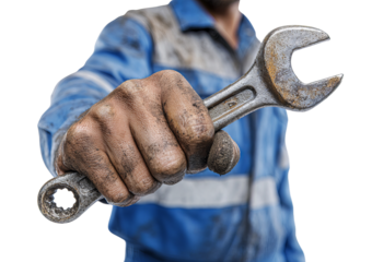 Dirty hand holding wrench in blue overalls isolated on a transparent background