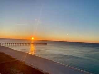 Sunrise over pier