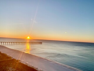 Sunrise over pier