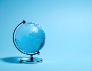 A clear, blue globe sits centered on a light blue background.  Study, explore, and visualize