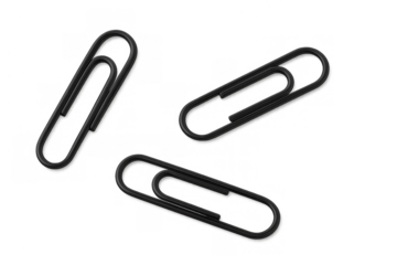 Black paper clips scattered, linking documents, essential office supplies for organization and paperwork
