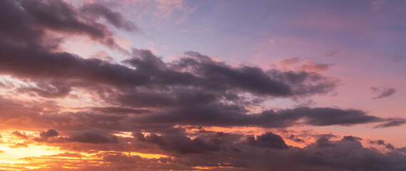 Sunset sky background, with colorful clouds. Evening colors.