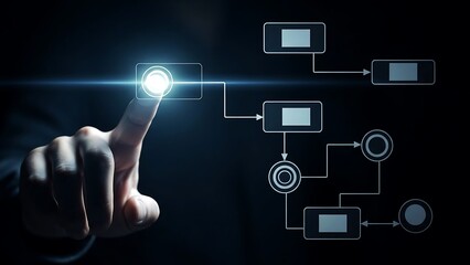 Finger touching glowing button initiating digital flowchart on dark background hand