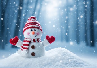 Fototapeta premium Cheerful smiling toy snowman in a red hat and scarf with heart mittens in the snow