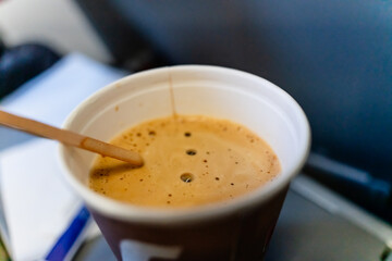 Coffee with milk in airplane
