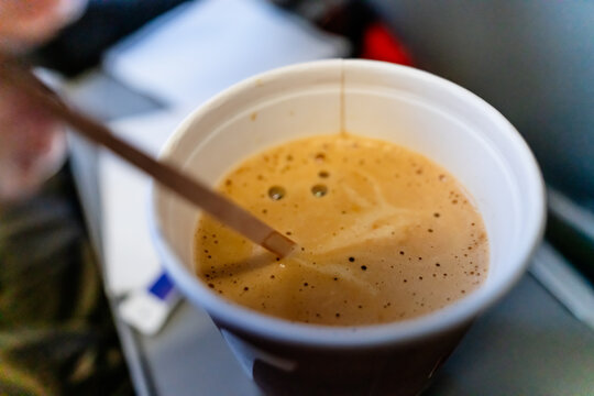 Coffee with milk in airplane